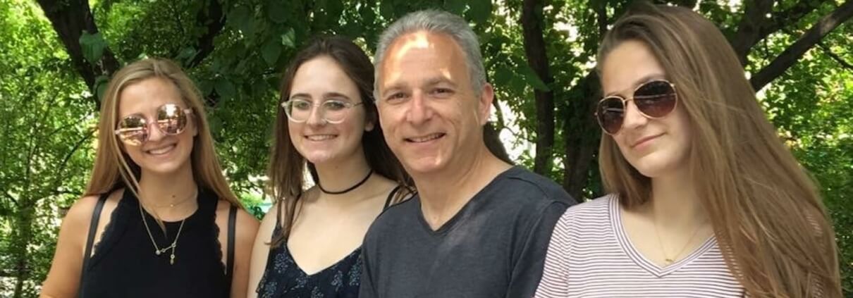 Larry Nisenson with his three daughters